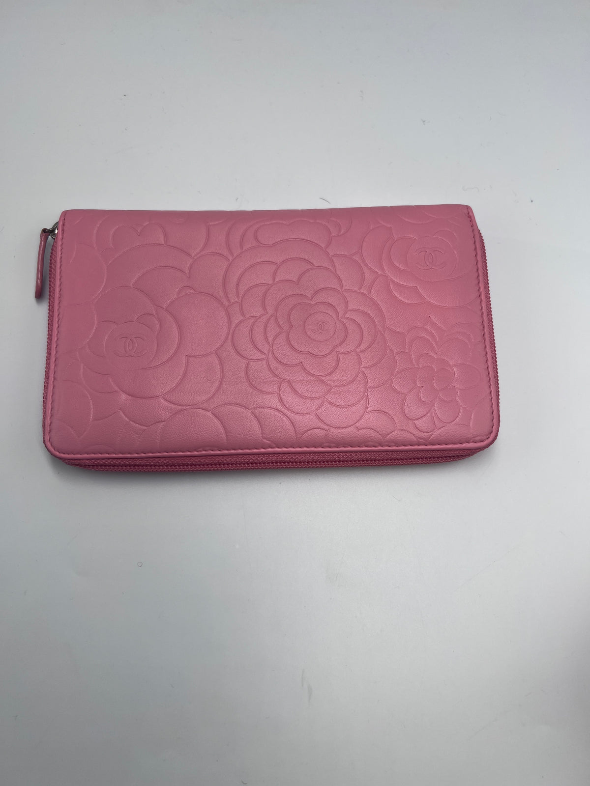 Chanel Camellia Embossed Zipped Long Wallet in Pink Lambskin with Silver Hardware