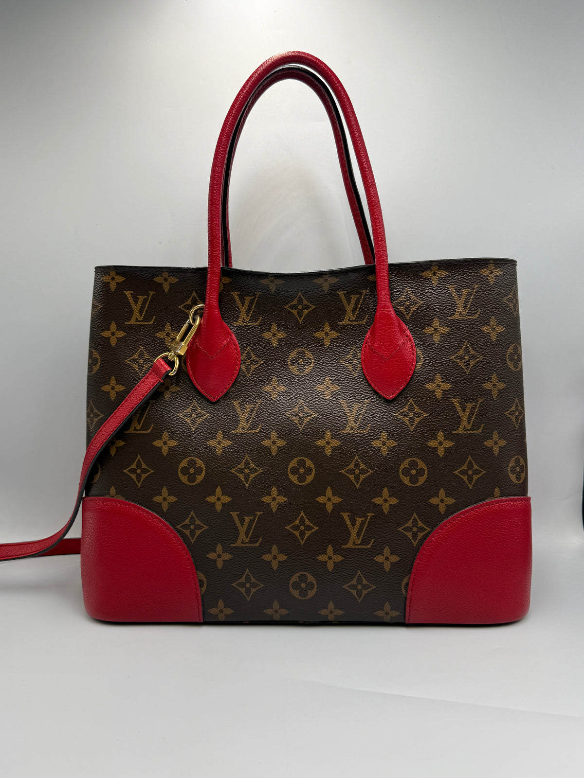 Louis Vuitton Flandrin Bag in Monogram Canvas and Red Calfskin