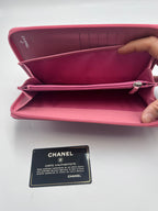 Chanel Camellia Embossed Zipped Long Wallet in Pink Lambskin with Silver Hardware