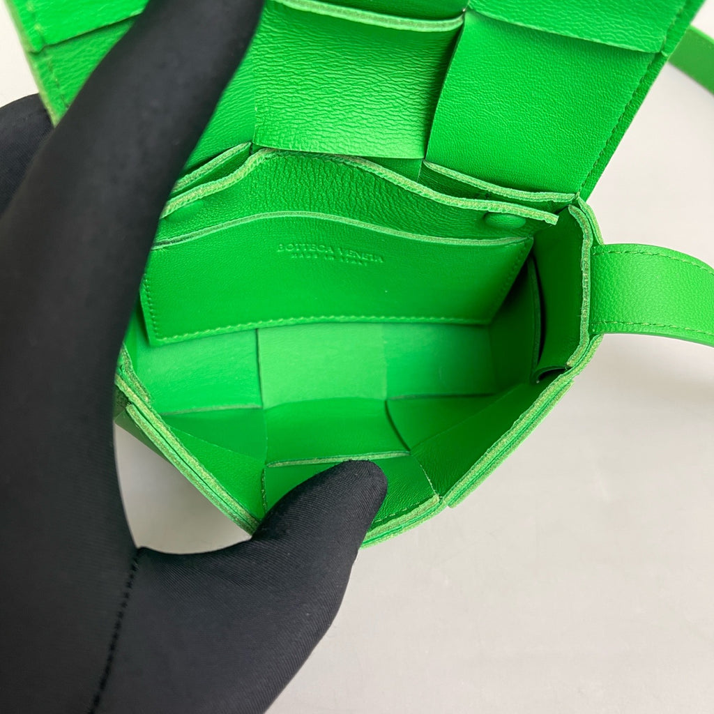 Bottega Veneta Candy Cassette Belt Bag in Parakeet Green Intreccio Leather