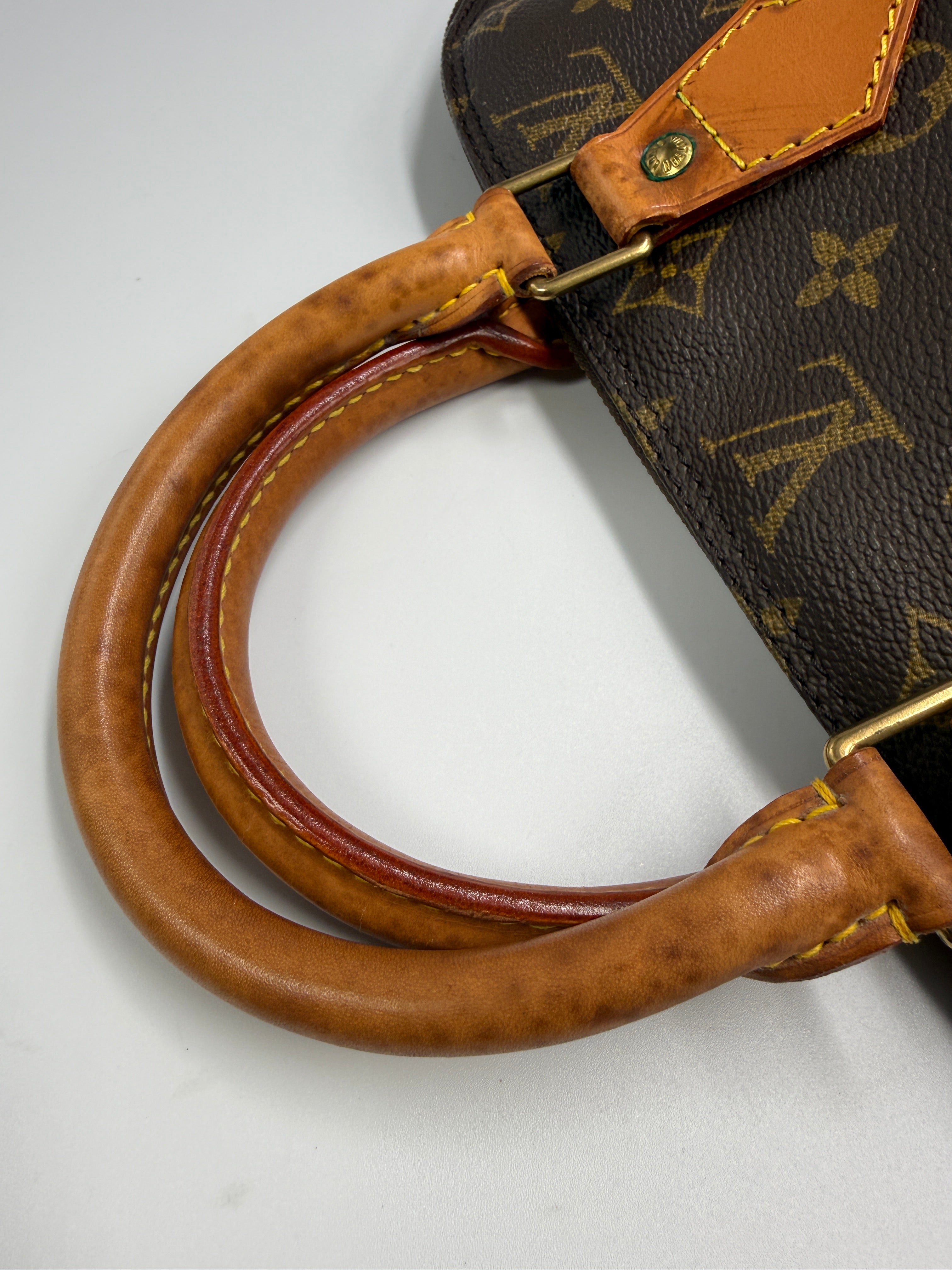 Louis Vuitton Alma MM Monogram Canvas Satchel Bag