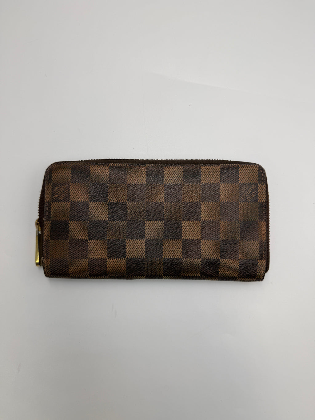 Louis Vuitton Zippy Wallet in Damier Ebene Canvas