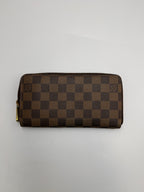 Louis Vuitton Zippy Wallet in Damier Ebene Canvas