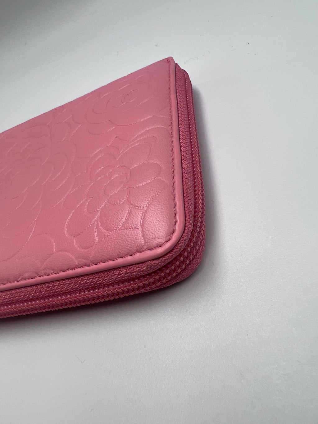 Chanel Camellia Embossed Zipped Long Wallet in Pink Lambskin with Silver Hardware