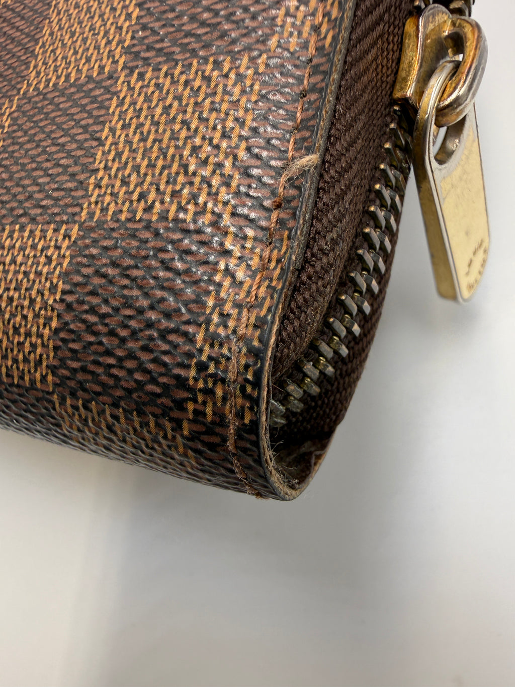 Louis Vuitton Zippy Wallet in Damier Ebene Canvas