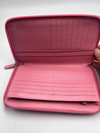 Chanel Camellia Embossed Zipped Long Wallet in Pink Lambskin with Silver Hardware