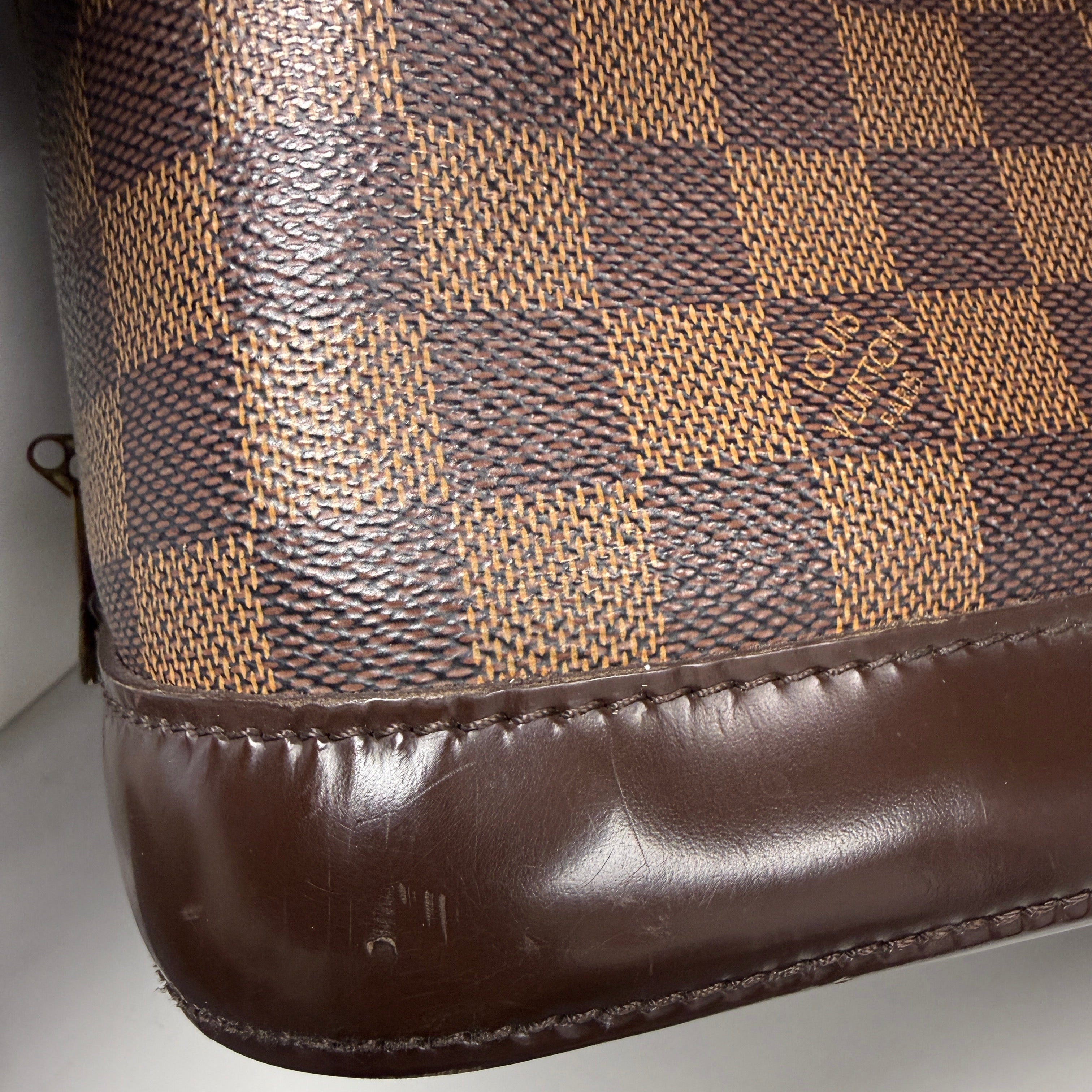 Louis Vuitton Alma PM in Damier Ébène Canvas