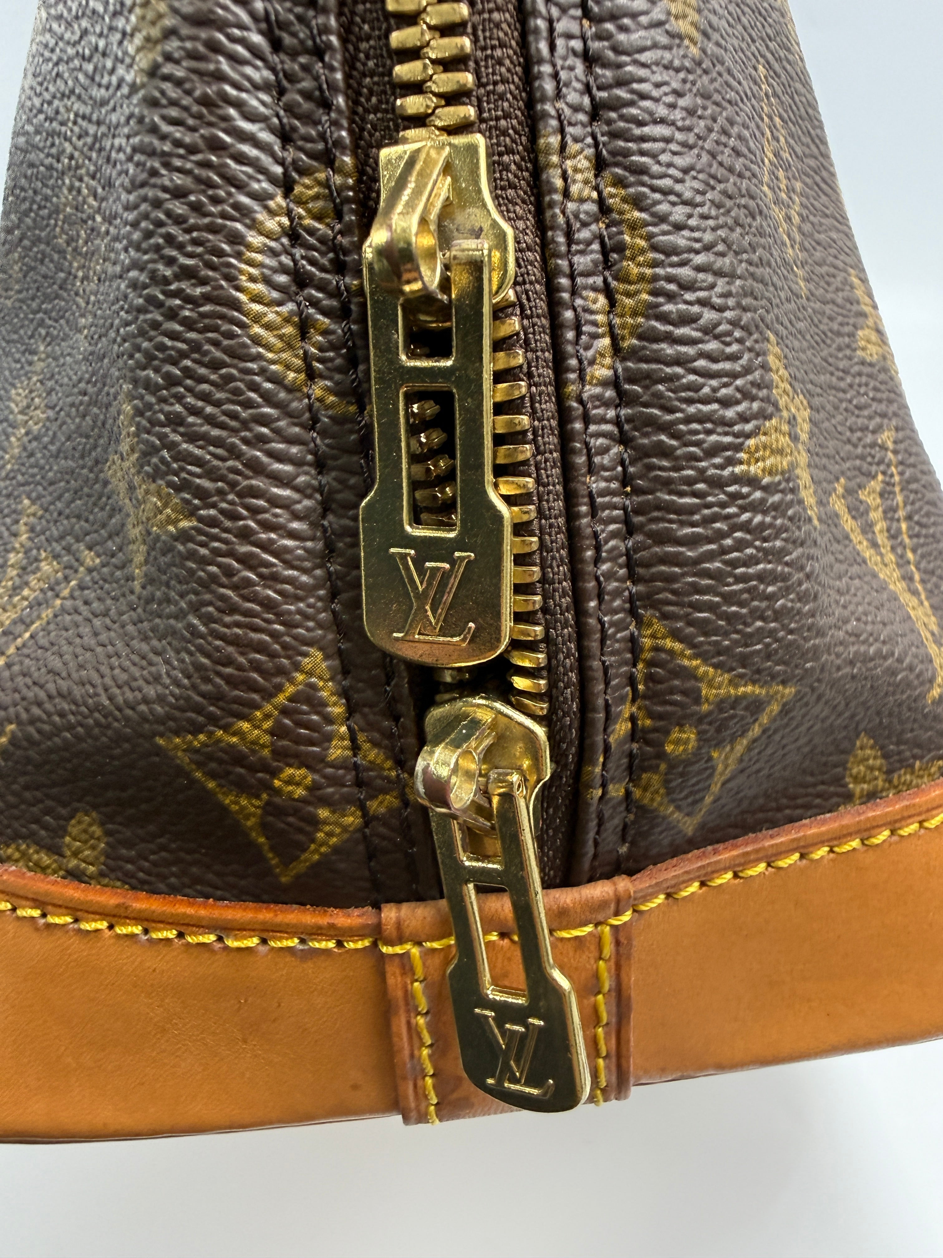 Louis Vuitton Alma MM Monogram Canvas Satchel Bag