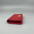 Gucci GG Marmont Matelassé Leather Super Mini Bag in Red