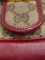 Gucci GG Marmont Small Shoulder Bag in Original GG Canvas with Red Leather Trim