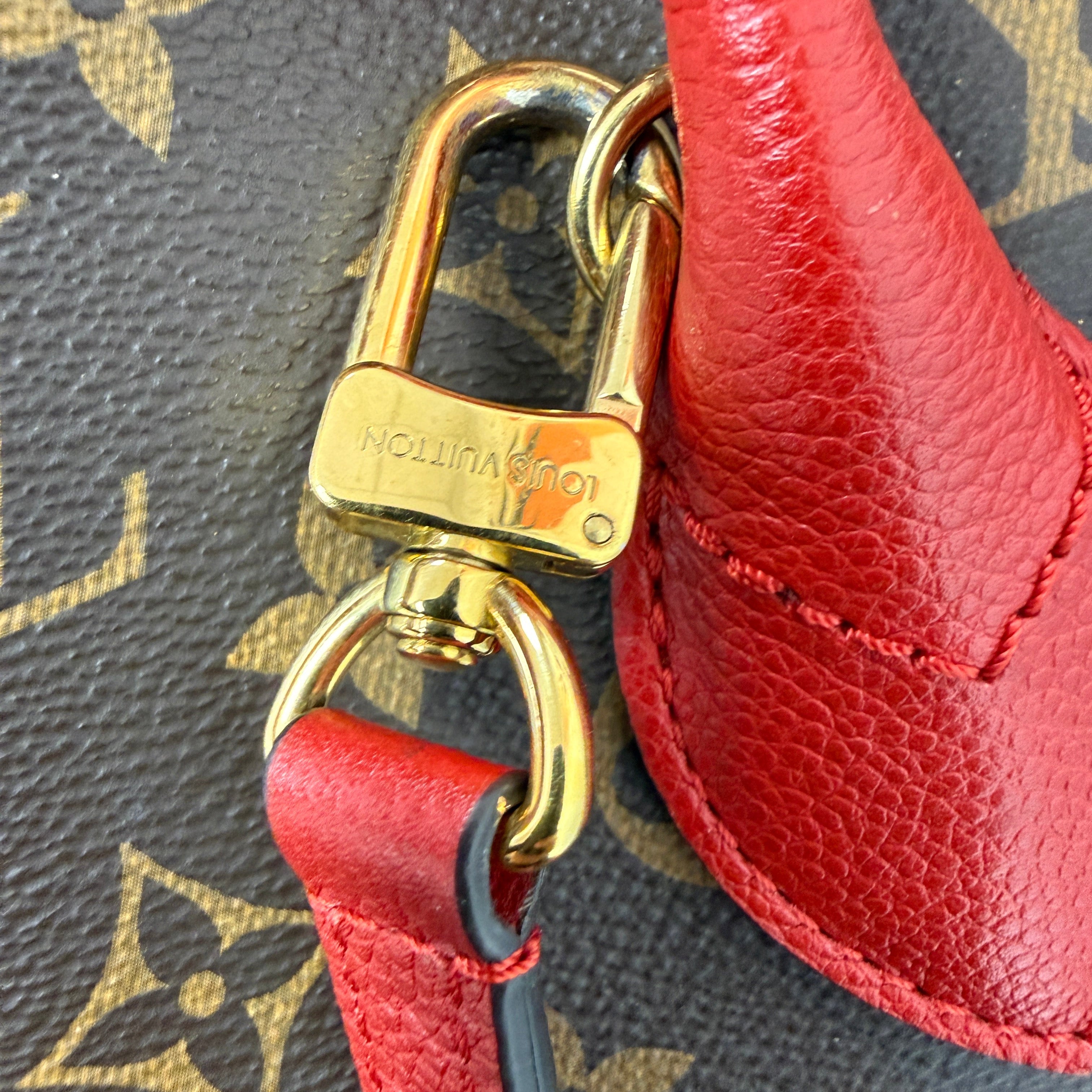Louis Vuitton Flandrin Bag in Monogram Canvas and Red Calfskin