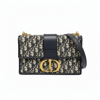 preowned authentic christian dior black and grey oblique monogram 30 montaigne crossbody bag with cd gold hardware logo in very good condition for sale preloved luxury designer bag at discount price 