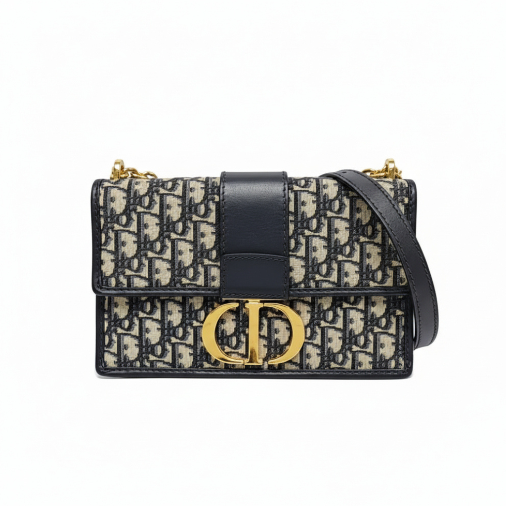 preowned authentic christian dior black and grey oblique monogram 30 montaigne crossbody bag with cd gold hardware logo in very good condition for sale preloved luxury designer bag at discount price 