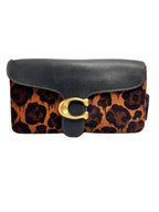Authentic pre-owned Coach Tabby Shoulder Bag 26 in leopard print calf hair and black leather with antique brass C hardware and dual straps.