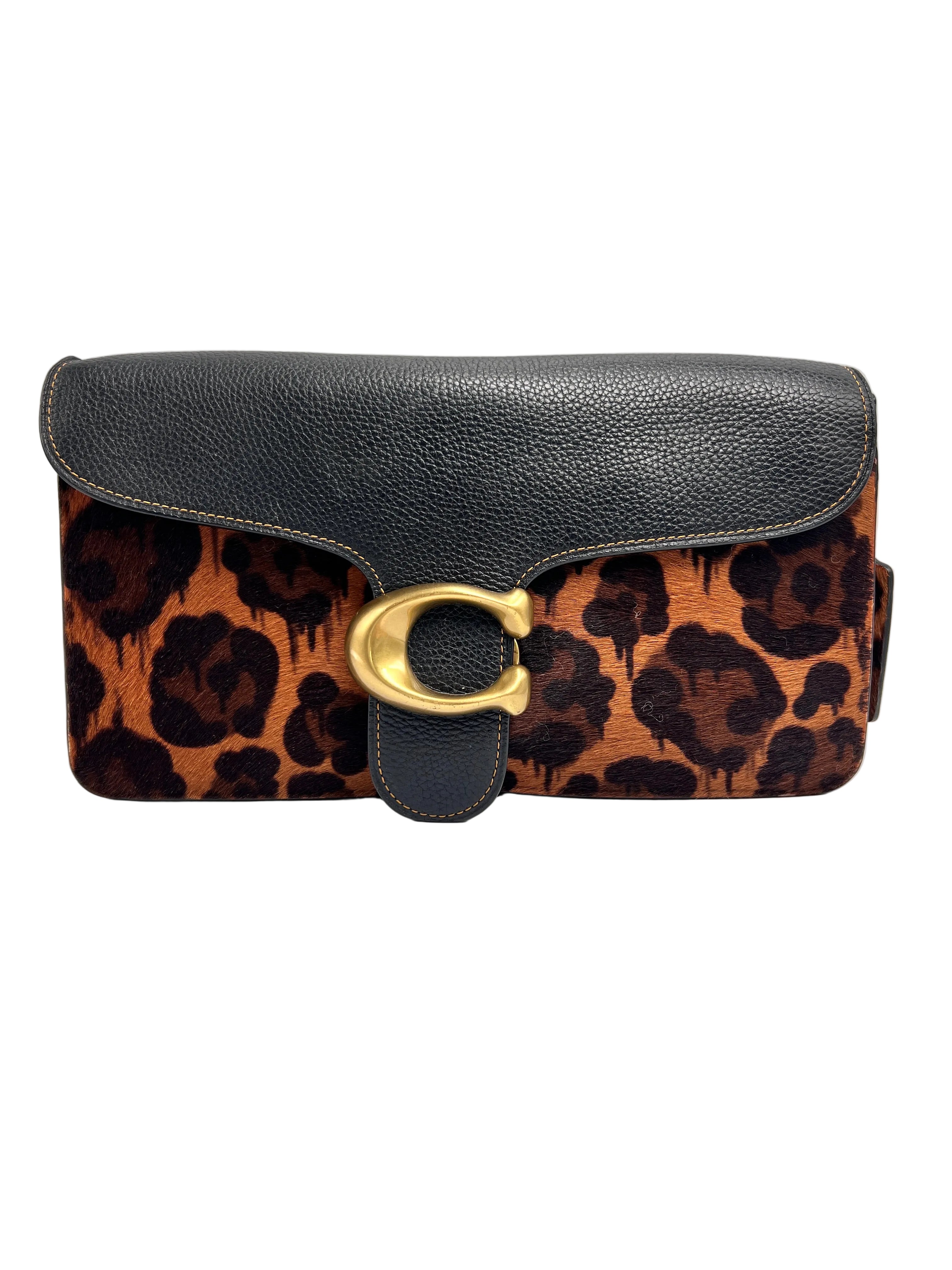 Authentic pre-owned Coach Tabby Shoulder Bag 26 in leopard print calf hair and black leather with antique brass C hardware and dual straps.