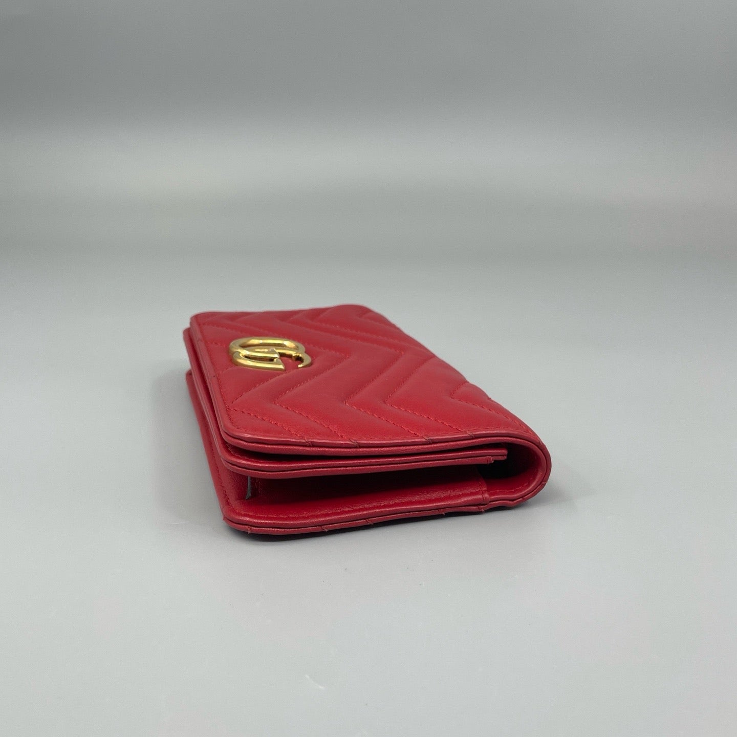 Gucci GG Marmont Matelassé Leather Super Mini Bag in Red