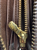 Louis Vuitton Zippy Wallet in Damier Ebene Canvas