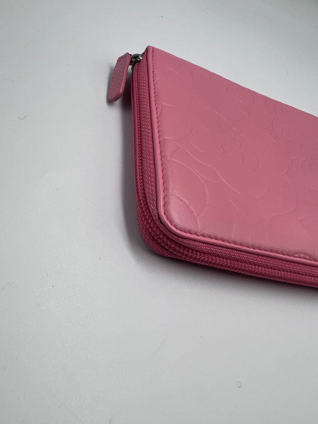 Chanel Camellia Embossed Zipped Long Wallet in Pink Lambskin with Silver Hardware