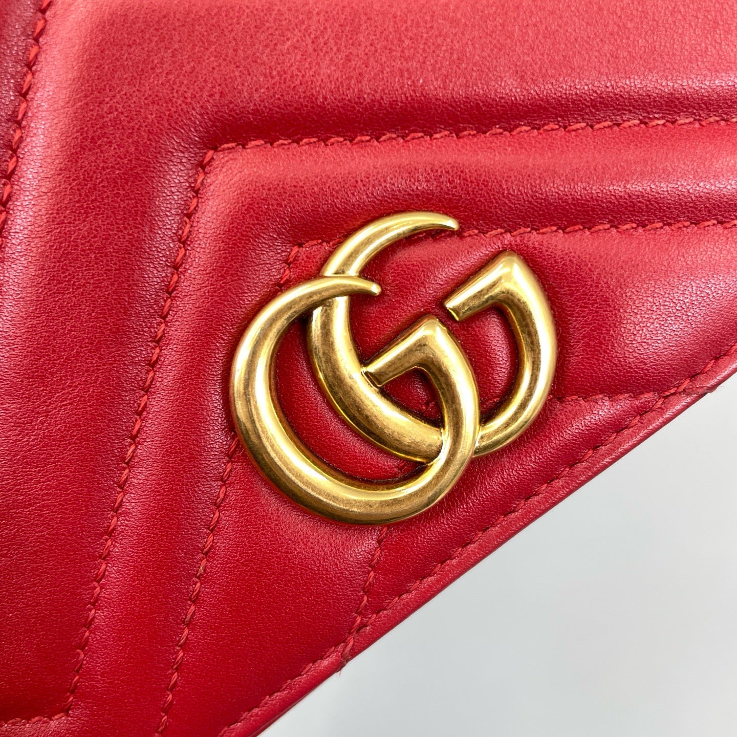 Gucci GG Marmont Matelassé Leather Super Mini Bag in Red