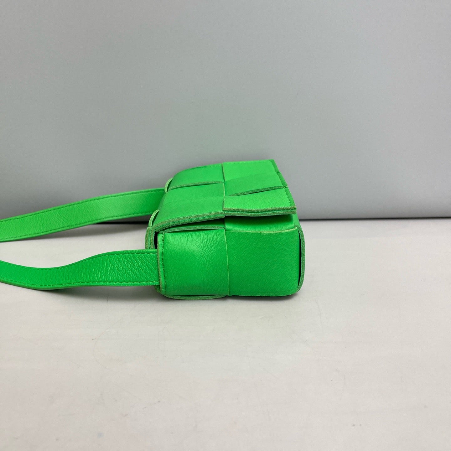 Bottega Veneta Candy Cassette Belt Bag in Parakeet Green Intreccio Leather
