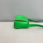 Bottega Veneta Candy Cassette Belt Bag in Parakeet Green Intreccio Leather