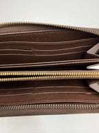 Louis Vuitton Zippy Wallet in Damier Ebene Canvas