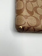 Coach East West Pop Up Messenger in Signature Canvas Brown/Saddle