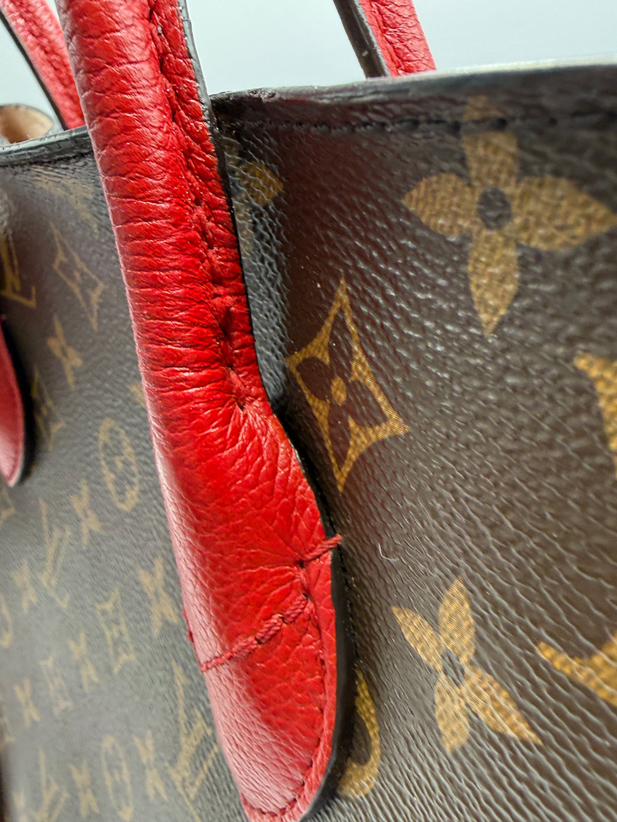 Louis Vuitton Flandrin Bag in Monogram Canvas and Red Calfskin