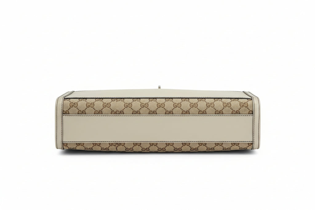 pre-loved gucci canvas with gg logo print  n Beige handbag with a patterned design