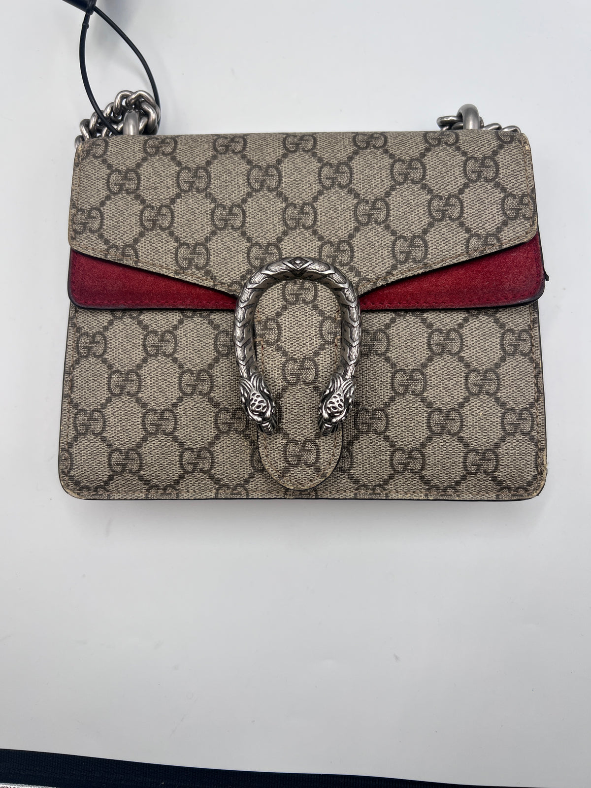 Authentic pre-owned Gucci Dionysus small shoulder bag in signature GG Supreme canvas with red suede details and antique silver-tone tiger head closure.