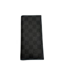A black and dark gray checkered leather wallet, featuring a textured checkerboard pattern, shown closed on a plain white background.