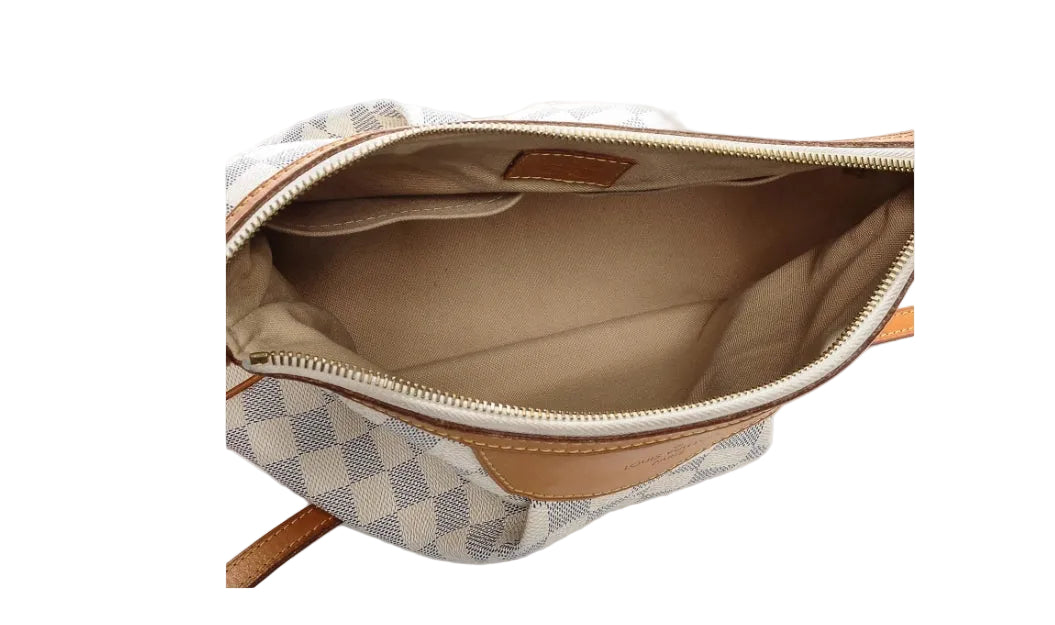 second hand lv shoulder bag with zipper closure interior is clean no mark or stain in very good condition