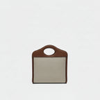 the back view of preowned burberry mini canvas pocket tophandle bag in excellent condition in brown leather and beige canvas