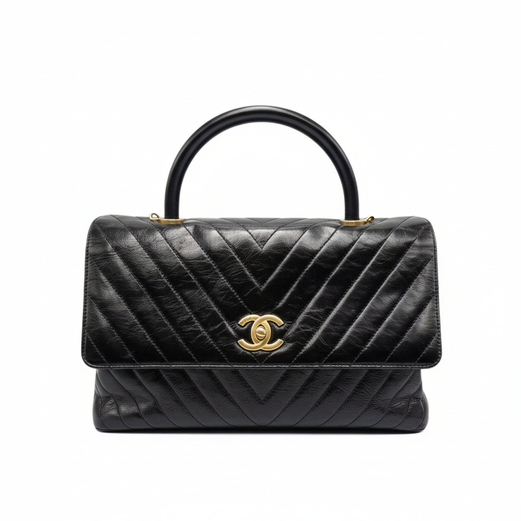 authentic preloved chanel top handle cocohandle in black leather with gold hardware in good condition for sale 