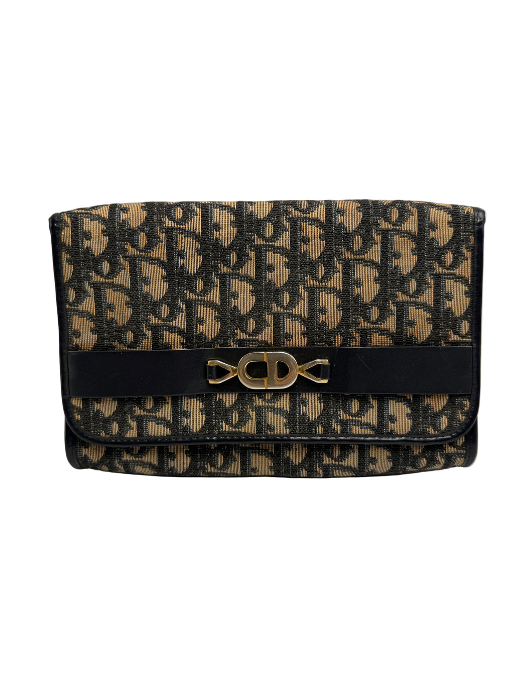 Front view of a vintage Christian Dior Trotter Oblique canvas clutch bag with navy pattern and central gold CD logo clasp.