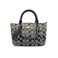 Front view of Coach Mini Kelsey Satchel in black and grey Signature monogram canvas with silver hardware.