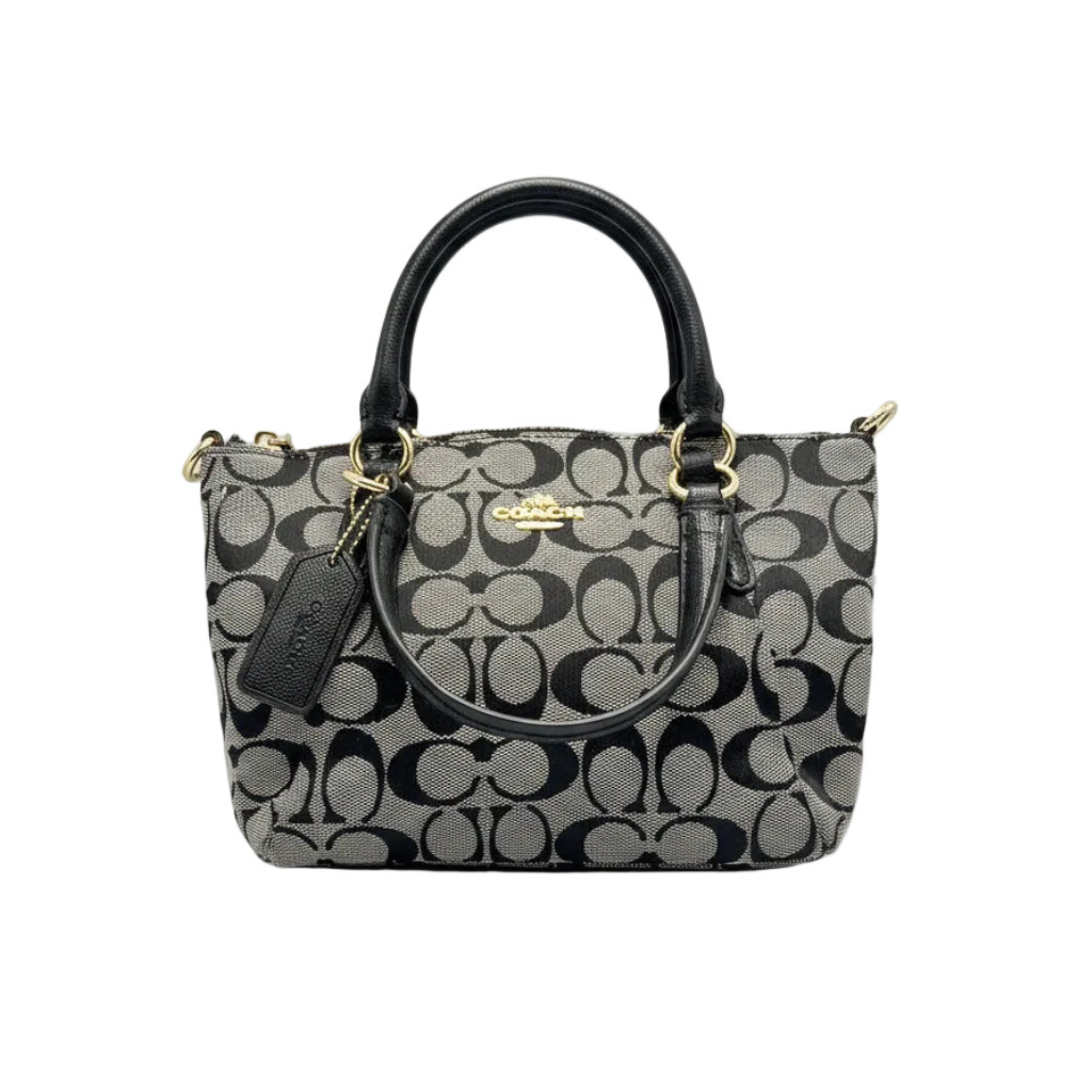 Front view of Coach Mini Kelsey Satchel in black and grey Signature monogram canvas with silver hardware.