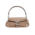 Front view of a Taupe Coach Tabby 26 bag with gold C hardware and matching crossbody strap on a white dust bag.