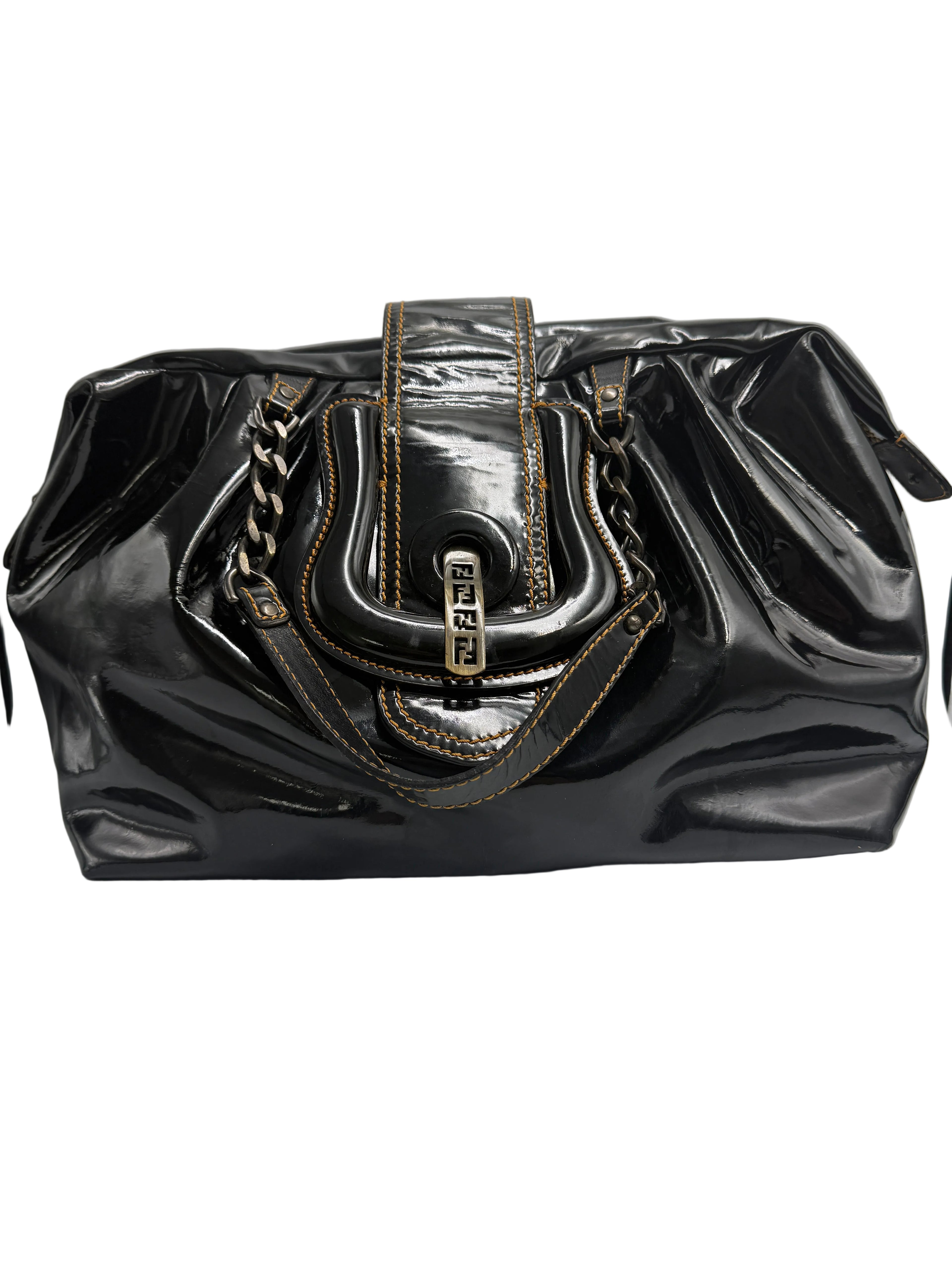 Front view of a Fendi vintage black patent leather Chef shoulder bag with contrast stitching, chain straps, and FF logo turn-lock fastener.