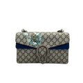 Front view of Gucci Dionysus Medium shoulder bag in GG Supreme canvas with blue floral Blooms print and blue suede trim.