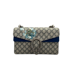 Front view of Gucci Dionysus Medium shoulder bag in GG Supreme canvas with blue floral Blooms print and blue suede trim.