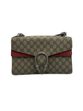 Front view of a Gucci Dionysus small shoulder bag in GG Supreme canvas with red suede trim and antiqued silver tiger head spur.