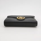 gucci black interlock g wallet on chain in size small with gold hardware and chain strap bottom view