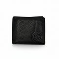 Front view of a black Gucci pebbled leather continental wallet with a gold-tone Interlocking G logo.