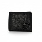 Front view of a black Gucci pebbled leather continental wallet with a gold-tone Interlocking G logo.