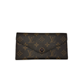 Front view of Louis Vuitton Josephine Wallet in Monogram Canvas; Interior view showing red leather lining and LV Paris Made in France heat stamp.