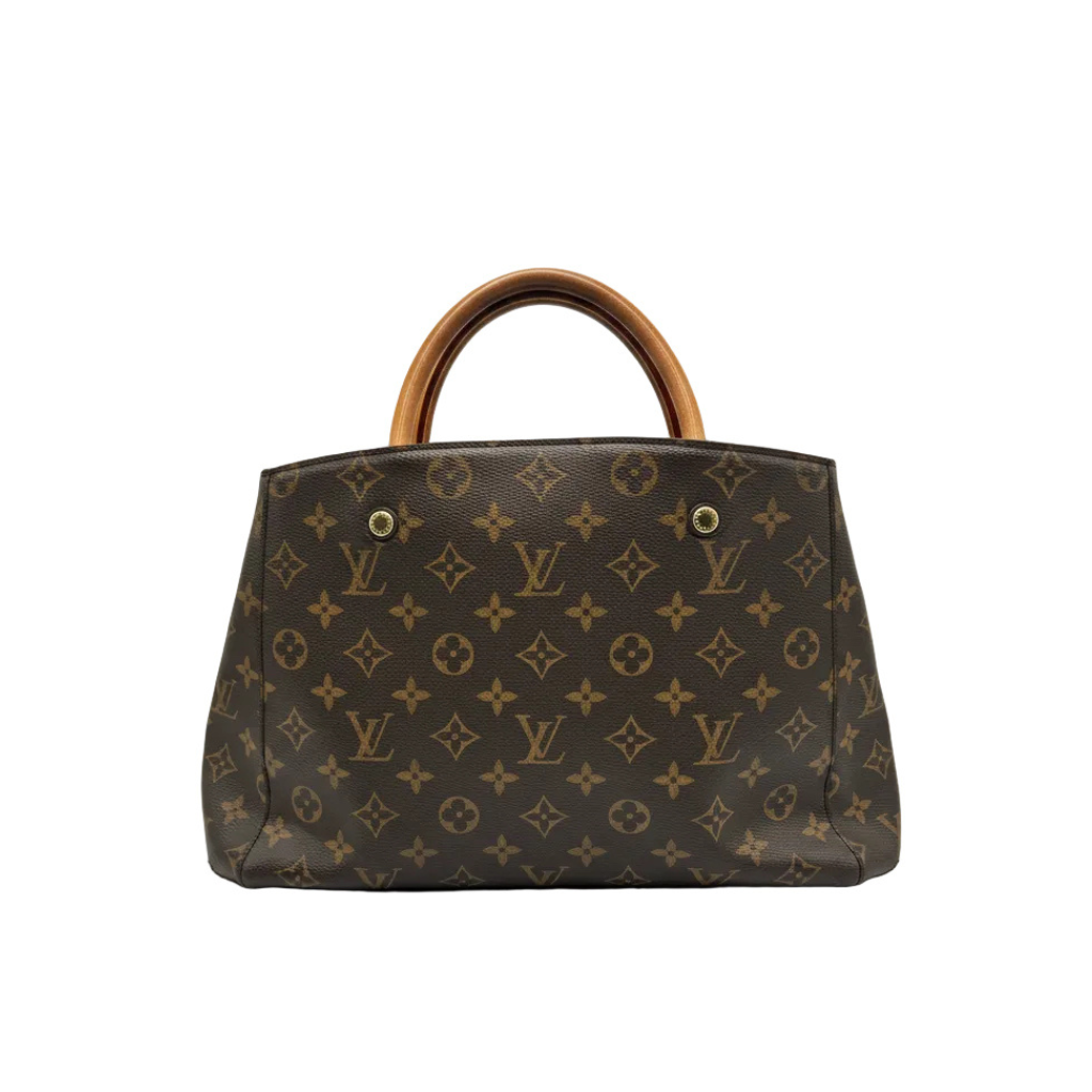 Front view of Louis Vuitton Montaigne BB bag in Monogram canvas with tan Vachetta leather handles and gold-tone hardware.