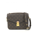 Front view of Louis Vuitton Pochette Métis in Monogram canvas showing S-lock closure