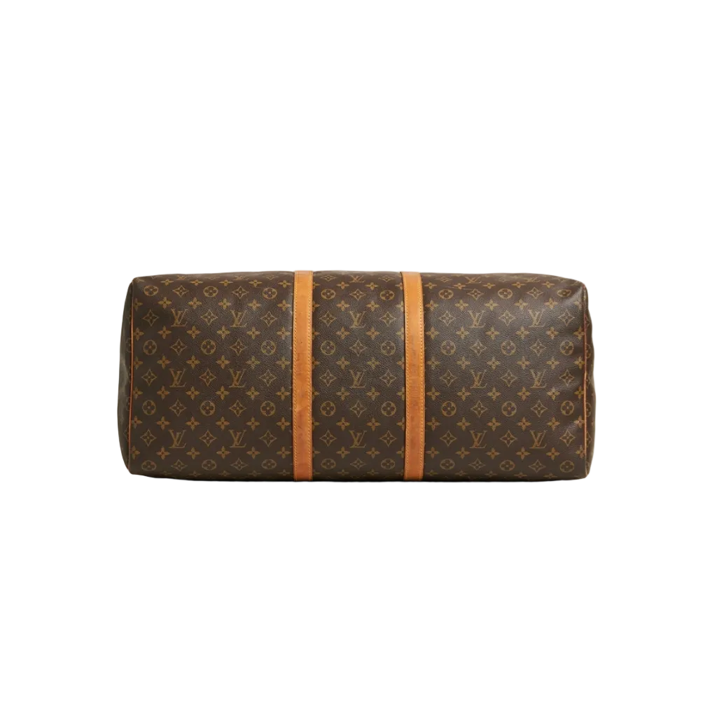 A Louis Vuitton monogram canvas duffel bag with two vertical tan leather straps, shown against a light gray background.