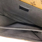 the interior of preloved louis vuitton metis pochette reverse monogram bag clean no marks or stain in the fabric